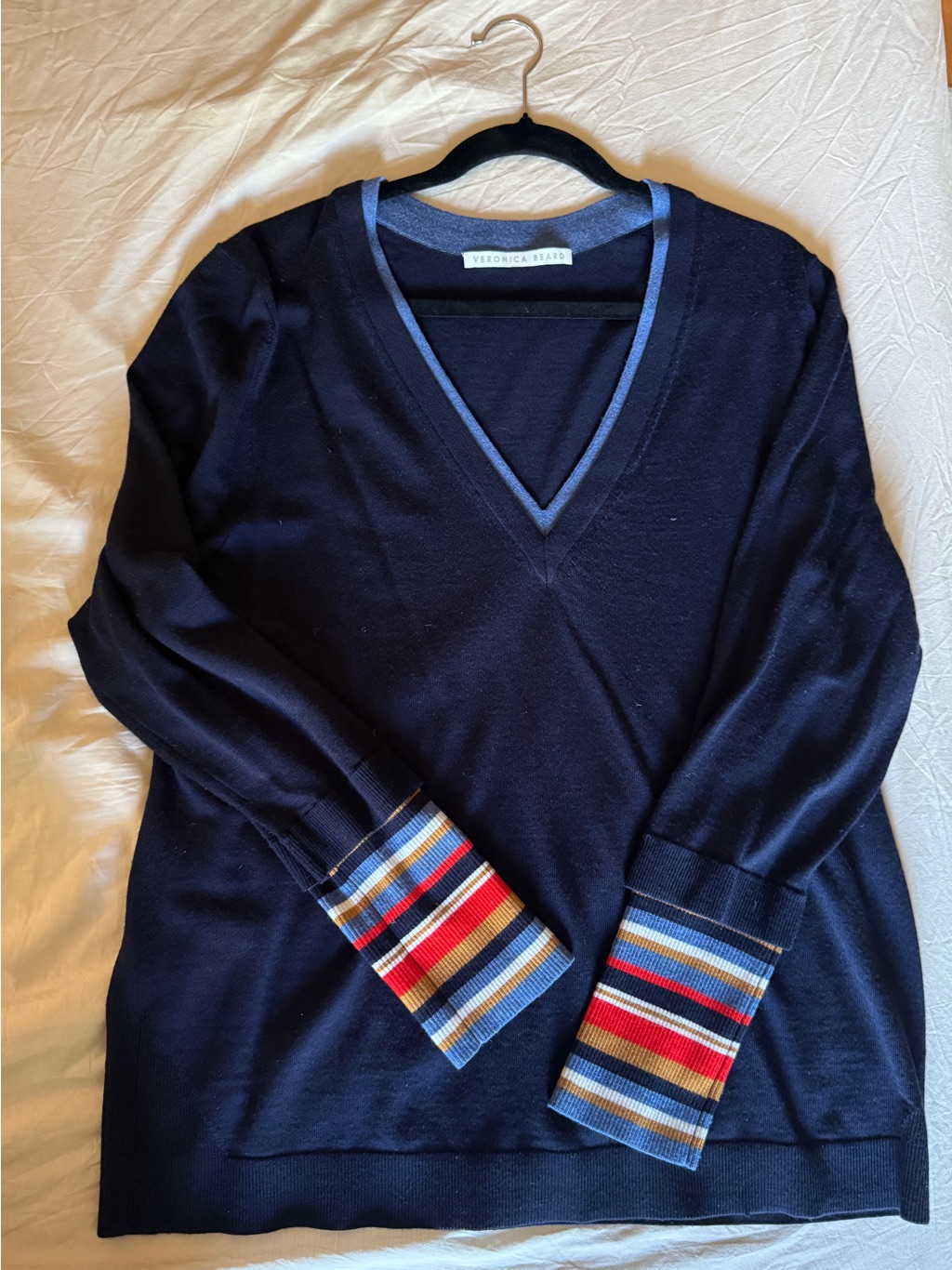 Veronica Beard Navy Merino V-Neck Sweater With Multicolor Stripe Cuffs.